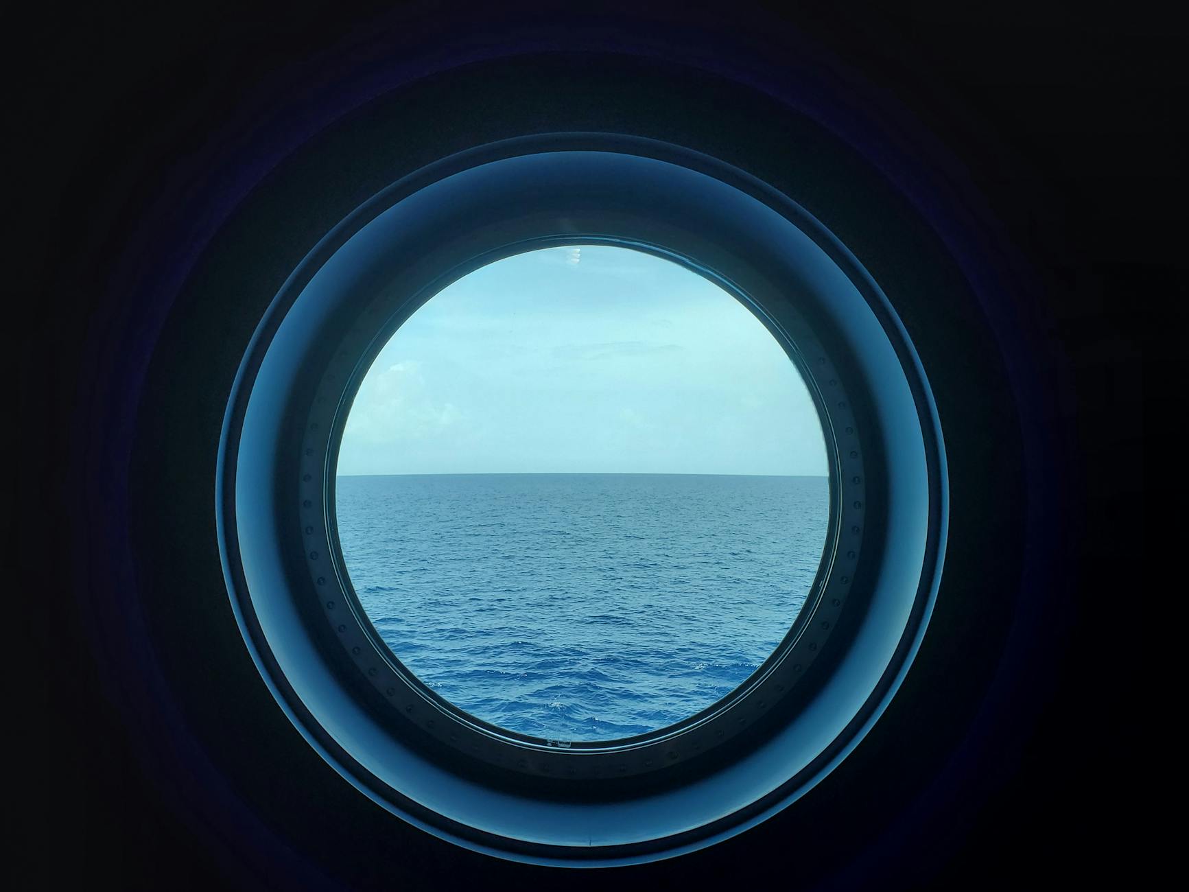 sea water behind circular window